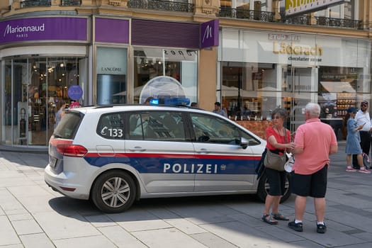 Police car during a police operation in a shopping street in the center of Vienna in Austria