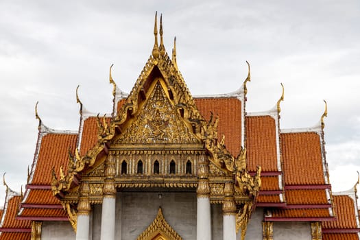 Wat Benchamabophit Dusit Wanaram (This temple is known as the Marble Temple) in Bangkok, blue sky and clouds. One of the most beautiful temples in Thailand Favorite destination in Bangkok. Daytime.