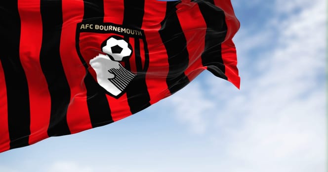Bournemouth, UK, Oct. 2022: Detail of AFC Bournemouth flag waving. AFC Bournemouth is an English football club based in Kings Park, Boscombe. 3d illustration render. Illustrative editorial