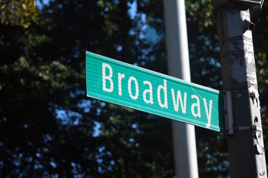 Broadway Street green traffic sign in New York