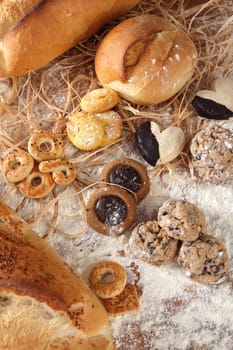 On a table a composition of biscuits and bread