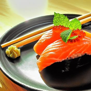 The Japanese menu. Tasty set of sushi with salmon and tuna with nice background color