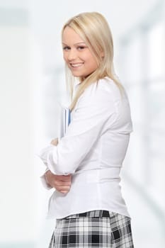 Student woman with note pad, isolated on white background
