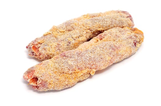 some breaded meat rolls ready to fry