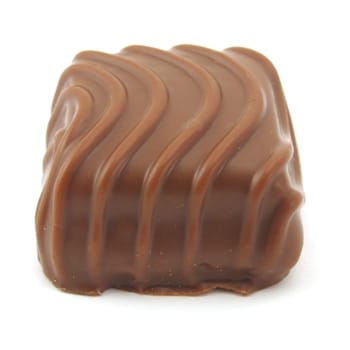 chocolate sweet candy or praline isolated on white background