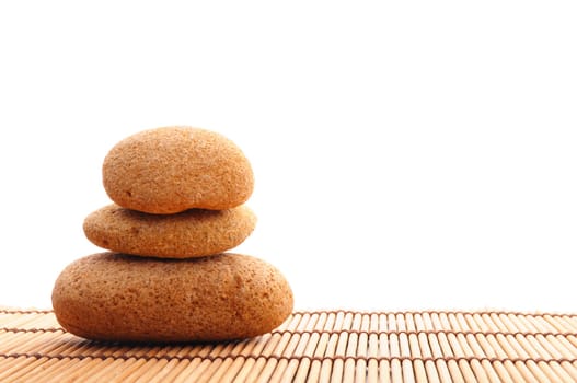 zen stone and green leaf showing spa or wellness concept
