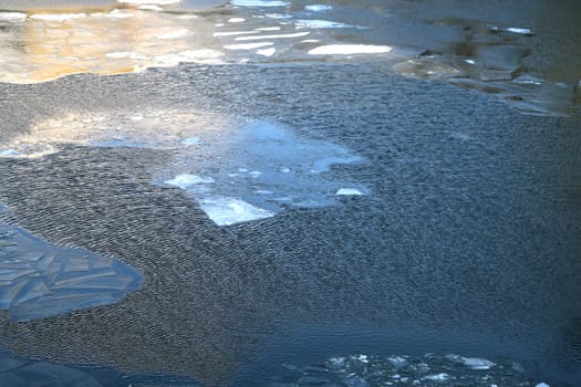 Texture of river ice photographed close up.