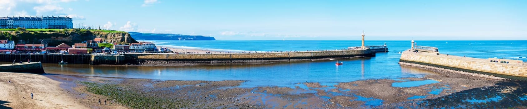Scenic view of Whitby city in autumn sunny day.Whitby's attraction as a tourist destination is enhanced by its association with the world famous horror novel Dracula, written by Bram Stoker