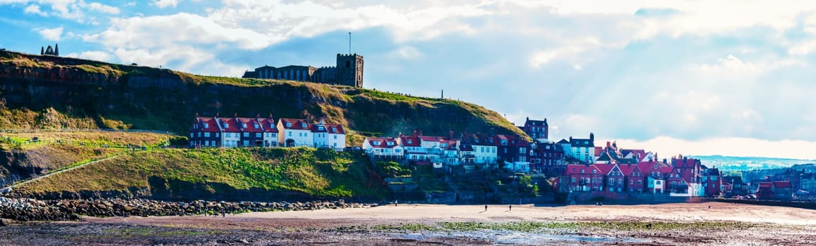 Scenic view of Whitby city in autumn sunny day.Whitby's attraction as a tourist destination is enhanced by its association with the world famous horror novel Dracula, written by Bram Stoker