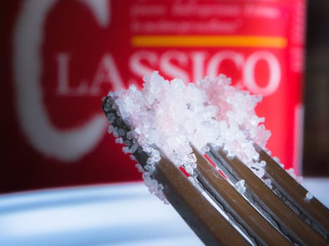 Fork sugar crystals. Macro image with sugar crystals on a fork