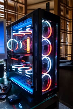 Milan, Italy 11 april 2023: High-end gaming computer setup with LED lighting for an immersive gaming experience.
