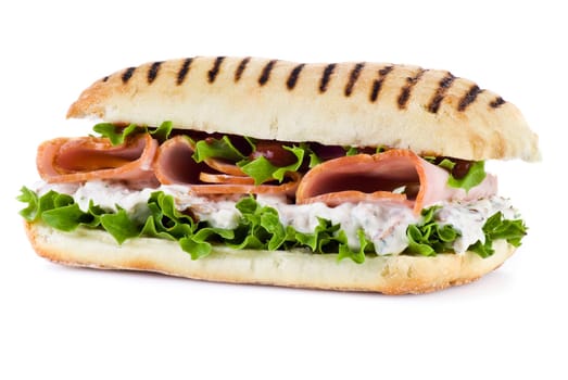 Ham and vegetable sandwich over white background