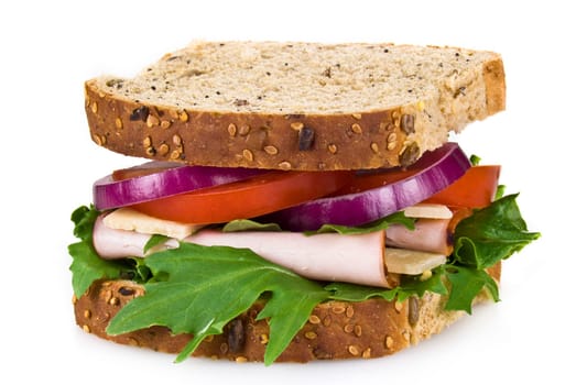 Freshly made ham and vegetable sandwich - isolated