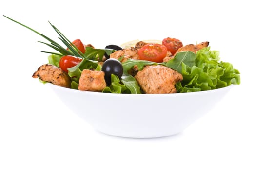 Chicken and vegetable salad isolated over white background