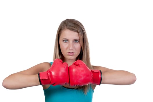 A beautiful young woman wearing a pair of boxing gloves