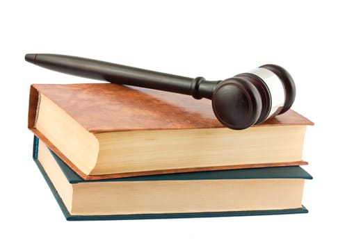 Books and gavel isolated on white background