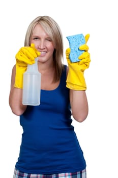 Aglove wearing beautiful woman or maid cleaning house with a sponge and spray bottle with cleaner