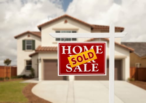 Sold Home For Sale Real Estate Sign in Front of New House.