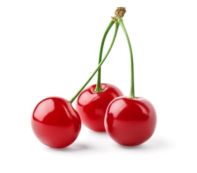 Three bright red cherries isolated on white background