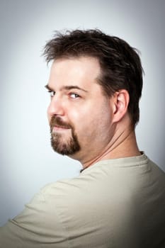 A handsome young man with a goatee beard