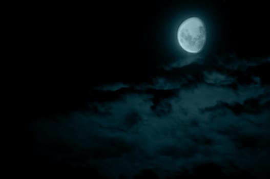 Mysterious Waning Gibbous Moon and Dark Clouds
