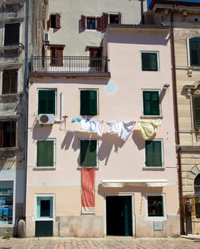old italian house with laundry