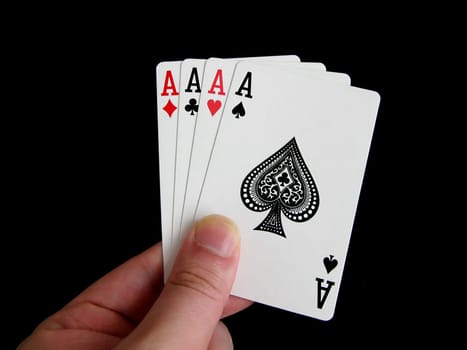 four of a kind aces cards isolated on black background