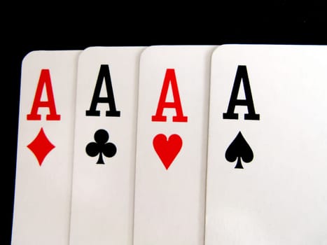 four of a kind aces cards isolated on black background