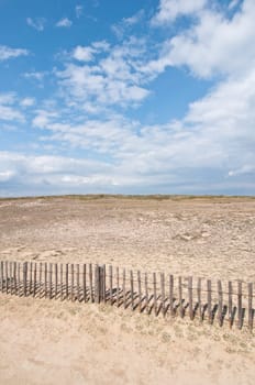 Dunes landscape with fence near Quiberon on Cote Sauvage