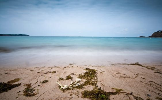 Long exposure photo of beach and sea