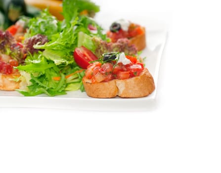 original Italian fresh bruschetta,typical finger food, with fresh salad and vegetables on background,MORE DELICIOUS FOOD ON PORTFOLIO