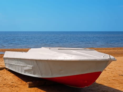 White sea boat at the beach