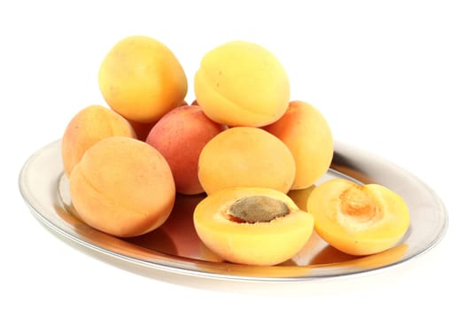 a group of sliced apricots on a white background