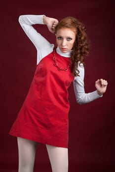 Young beautiful lady in red dress