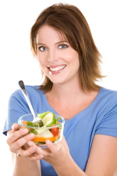 pretty casual brunette wearing blue top eating salad