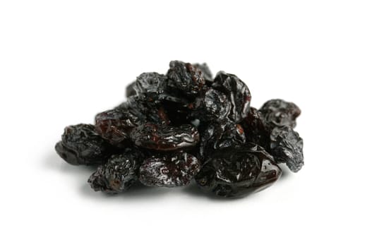 Black raisin close-up Isolated on white background