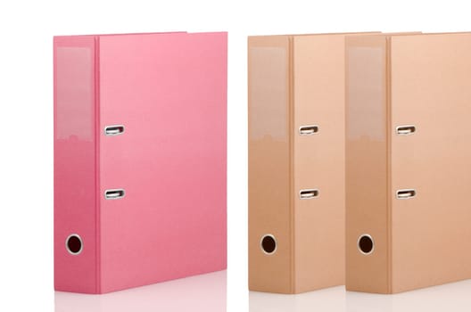 Three binders on white background.