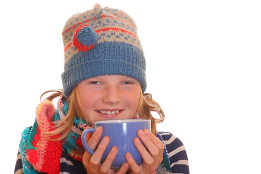 Winter girl with a cup of hot beverage on white background