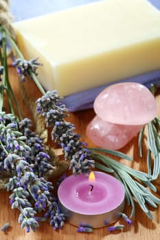 Set of products of lavender on a wooden table.