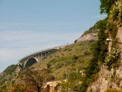 bridge over a mountain road, Italy