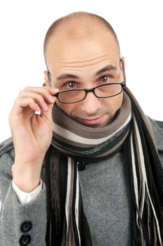 Attractive male wearing a coat and scarf isolated on a white