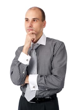 Portrait of handsome young business man looking away. Isolated on white