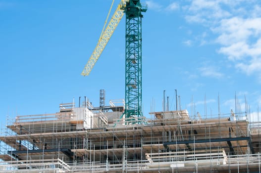 large crane above a not yet finished building