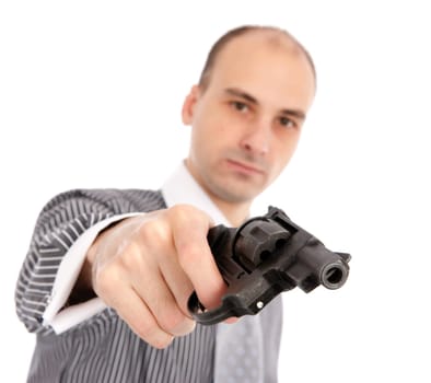 Young attractive man with gun isolated on white