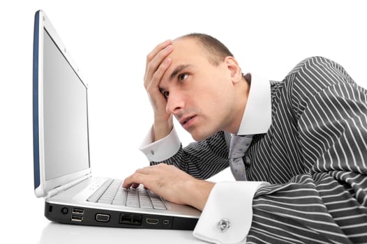 Worried businessman with computer isolated on white