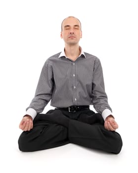 businessman meditating in yoga lotus. Isolated on white background
