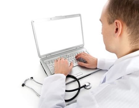 Rear view of a young doctor with laptop
