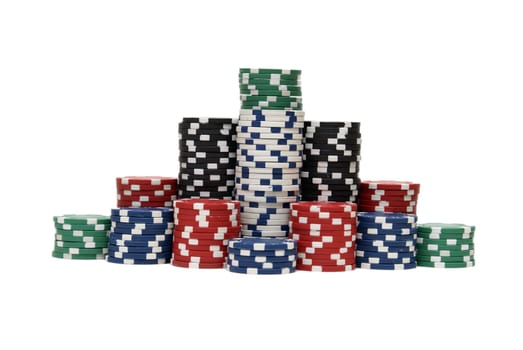 Stacks of poker chips in various colors are isolated on white.