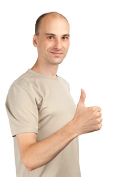 Young man with a thumb up sign. Isolated over white.