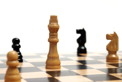 A closeup shot of a strategic game of chess.